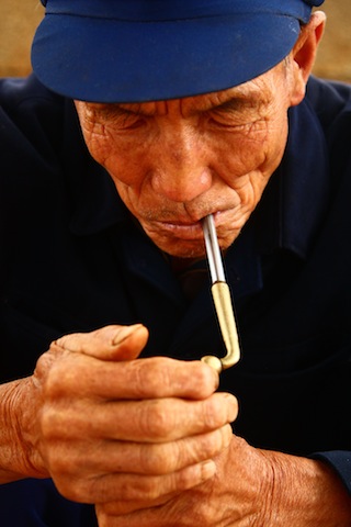 Man with pipe, Yunnan
