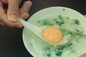 Congee with herbs and egg