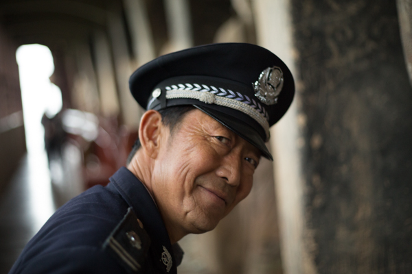 A laughing policeman, Maijishan, Gansu