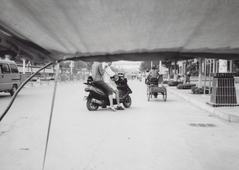 Street scene from a rickshaw, Qufu